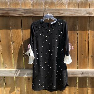 Cute LBD with Pearl accents. Worn once. Sz Sm.